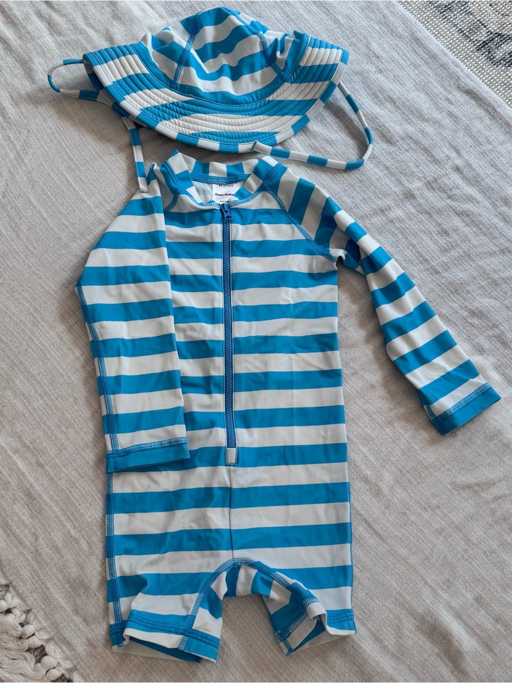 Hanna Andersson Blue and White Striped Kids One-Piece Swimsuit with Hat